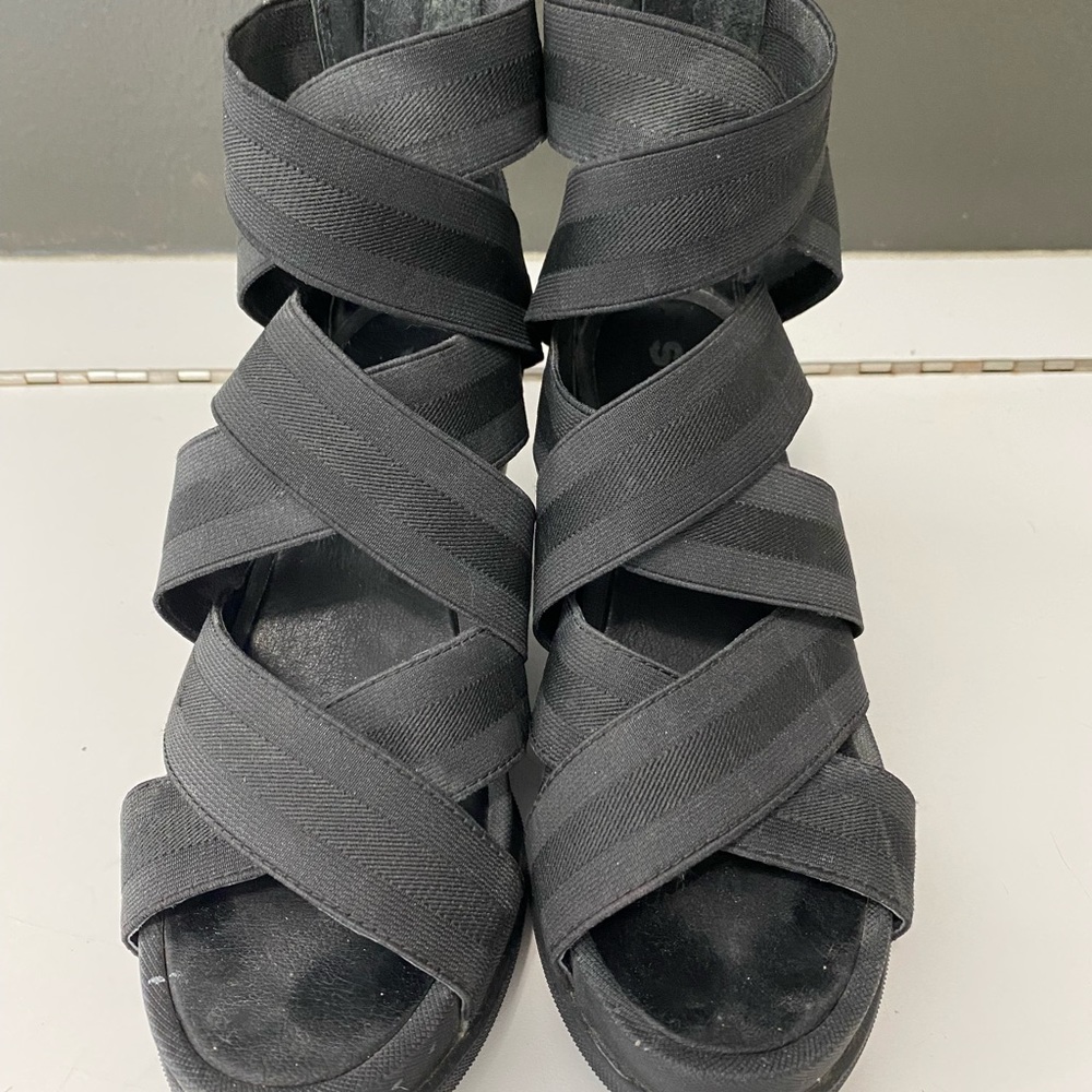 Gently worn Sorel wedge strappy sandal. Heel is 3 inches.